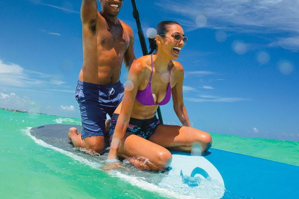 Couple on paddle board