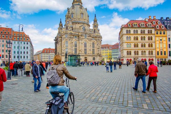 Tourists wander the streets of Dresden.