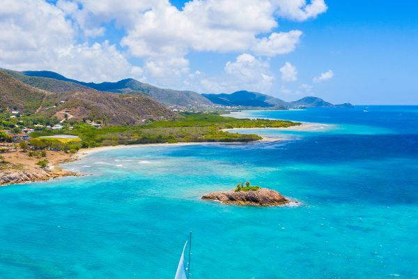 Clear water with sail boat