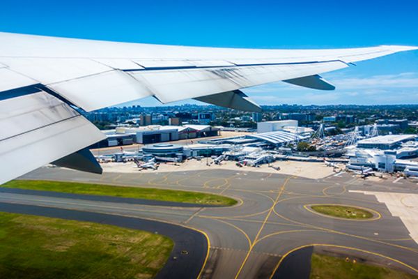 view of sydney airport from window of plane