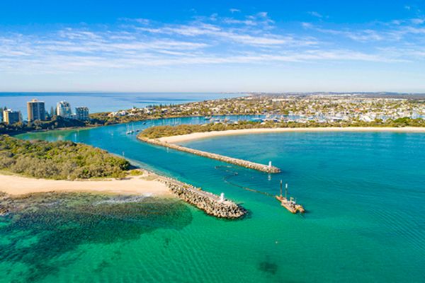 Overhead shot of the city of Mooloolaba, with a focus on the ocean
