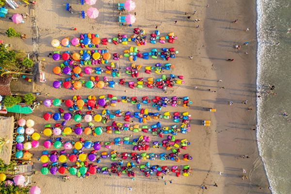umbrellas and chairs on beach in seminyak