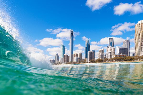 Surfer's Paradise framed by a wave
