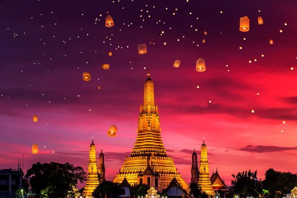 Wat Arun Ratchawararam Ratchawaramahawihan at night in Thailand