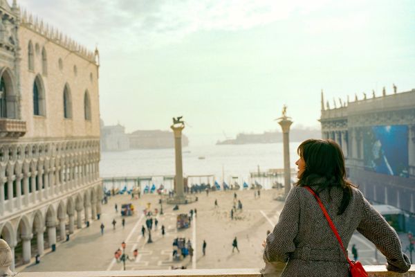 Lady overlooking balcony