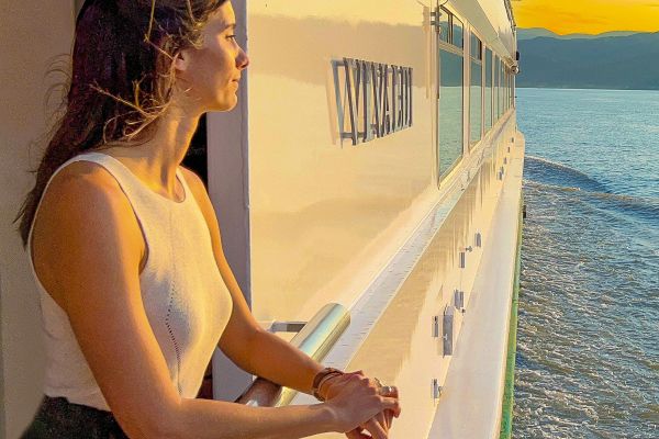 Lady looking over balcony