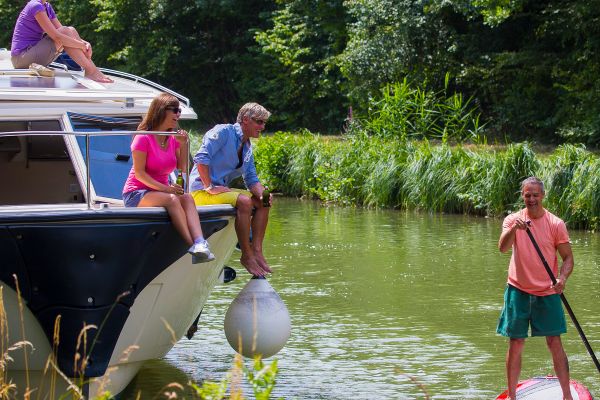 River boat and paddle board