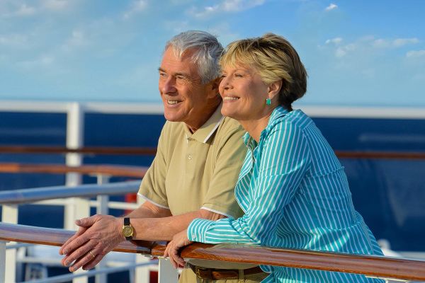 Couple looking over balcony