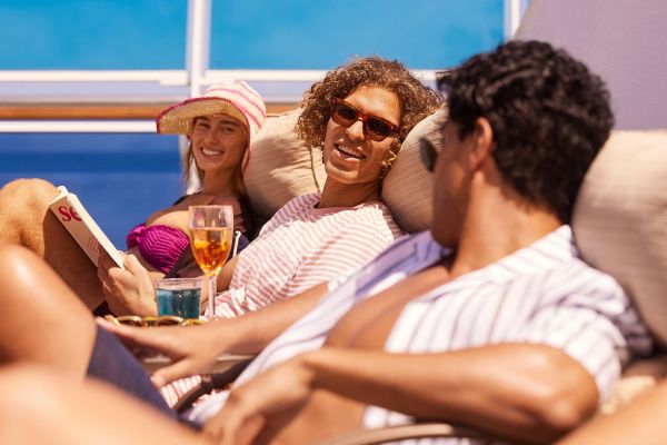 Friends hanging around in deck chairs