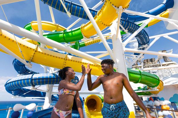 Kids in front of water slides