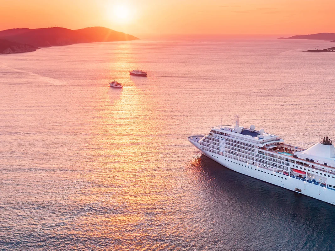 Aerial of Cruise ship at sunset