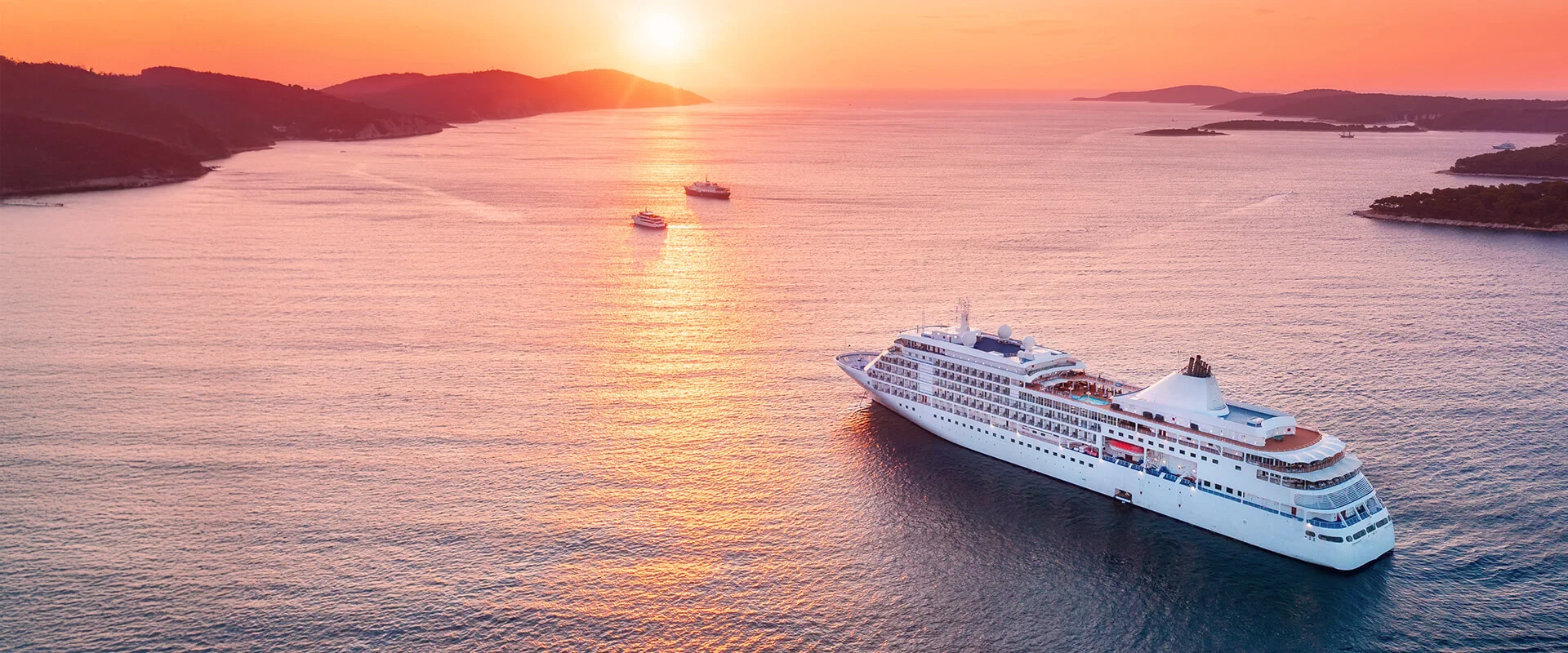 Aerial of Cruise ship at sunset