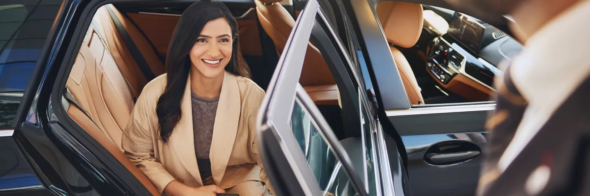 Etihad Airways supplementary stopover car service with passenger being escourted.