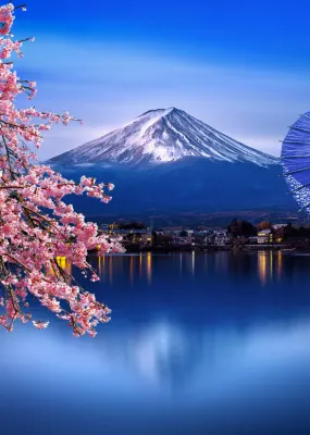 Asian woman wearing Japanese traditional kimono at Fuji mountain and cherry blossom, Kawaguchiko lake in Japan.