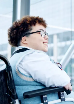 A wheelchair user in an airport