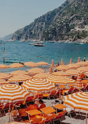 Orange and white beach umbrellas in Sicily, Italy