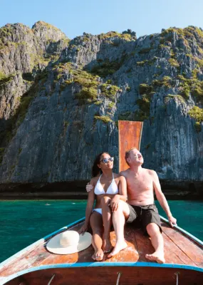 Couple on boat in Maya Bay, Phi Phi islands, Thailand