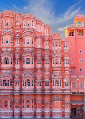 big pink building with lots of windows