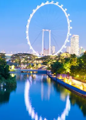 towers and ferris wheel in singapore