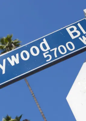 blue wayfinding signage indicating holywood BL