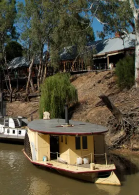 boats line up the Echuca Moama in Murray River