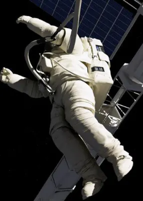 Astronaut in a white space suite floating through space past the International Space Station