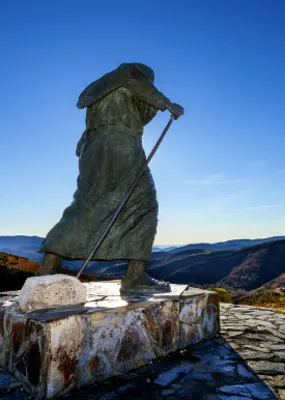 Camino pilgrim monument facing a fascinating view 