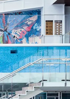 a person swimming though Flynn hotel cairns pool