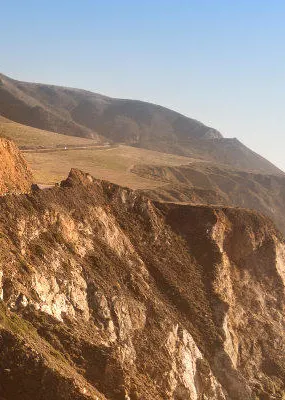 Long railroad bridge connecting two hills