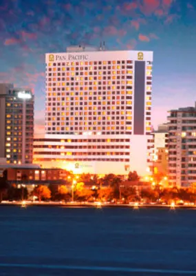 Pan Pacific building and other tall skyscrapers with their magical lights open