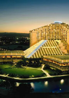 Luxurious casino with lights during the sunset