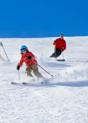 a family enjoying a nice skii together