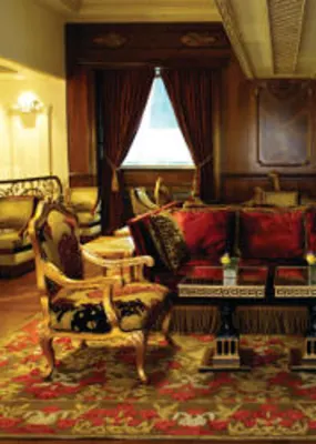 luxurious lobby with velvet sofa and mats across the living room 