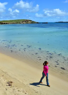 Lady walking around the beach 