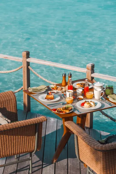 breakfast ocean side, luxury travel holiday, the Maldives
