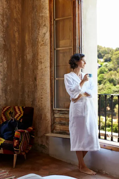 Luxury Travel: Woman relaxing in in a luxury hotel in Barcelona, Spain