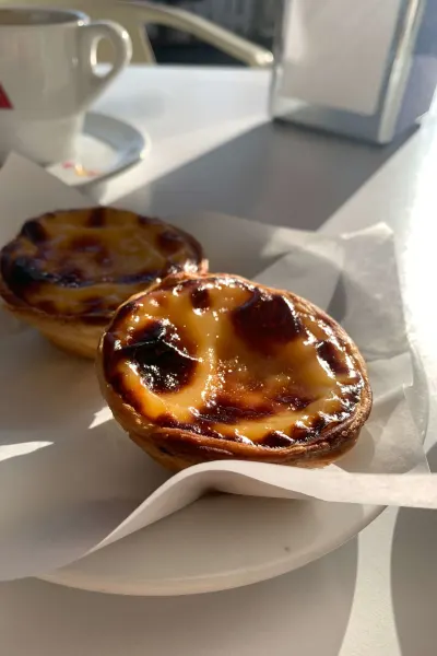 Sample delicious pastel del nata on a luxury travel holiday to Portugal