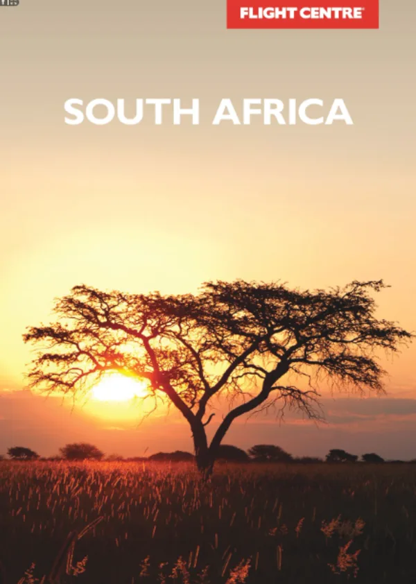 The sun sets over an open African plain