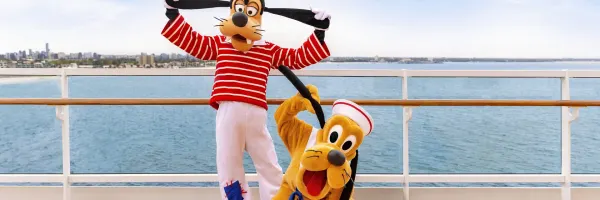 Pluto and Goofy on the deck of a Disney Cruise ship