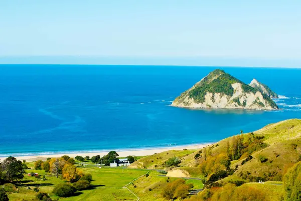 Grassy hills overlooking water