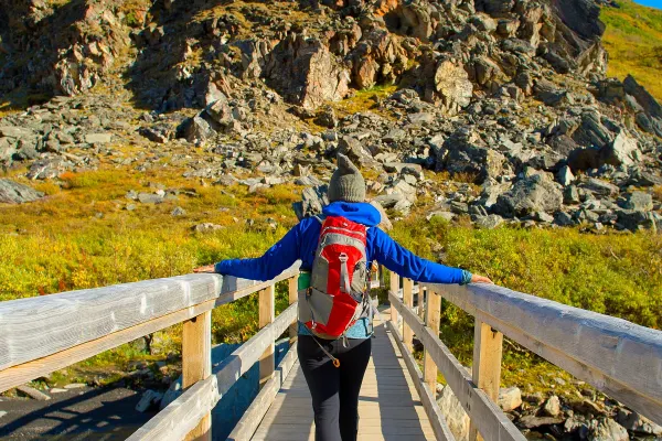 Walking across bridge