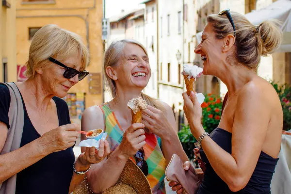 Elderly women eating ice cream