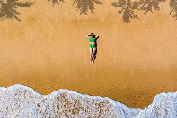 Person laying on beach