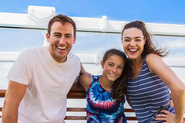 Family of 3 smiling