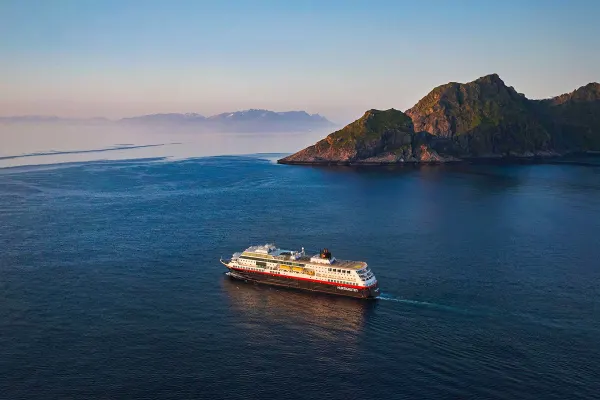 Drone shot of cruise ship at twilight