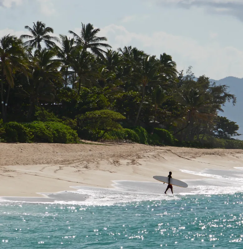 Surfers in Hawaii, luxury travel holiday 