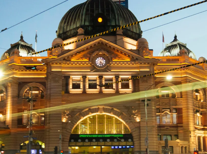 Flinders Street Railway Station in Melbourne in the early evening
