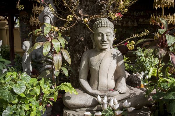 A Buddhist statue in a garden in Phnom Penh