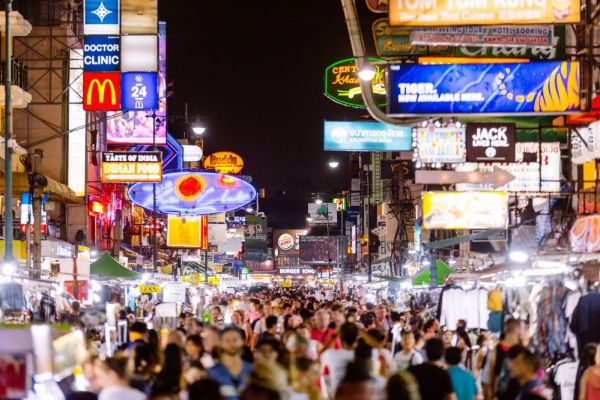 Night life, extremely crowded street with bright signs
