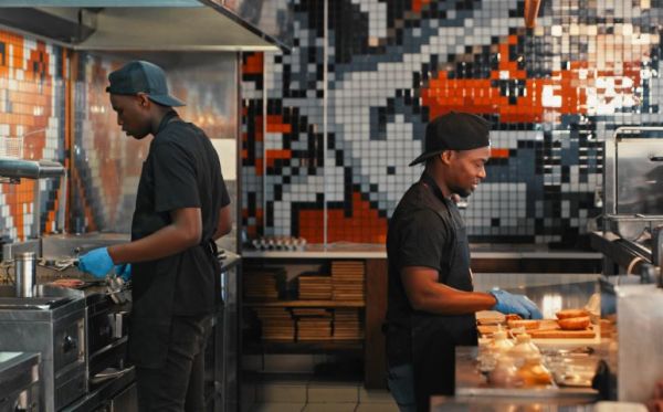 men cooking in commercial kitchen